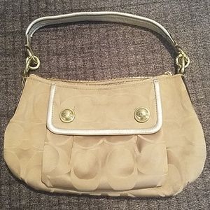 Tan and gold Coach purse